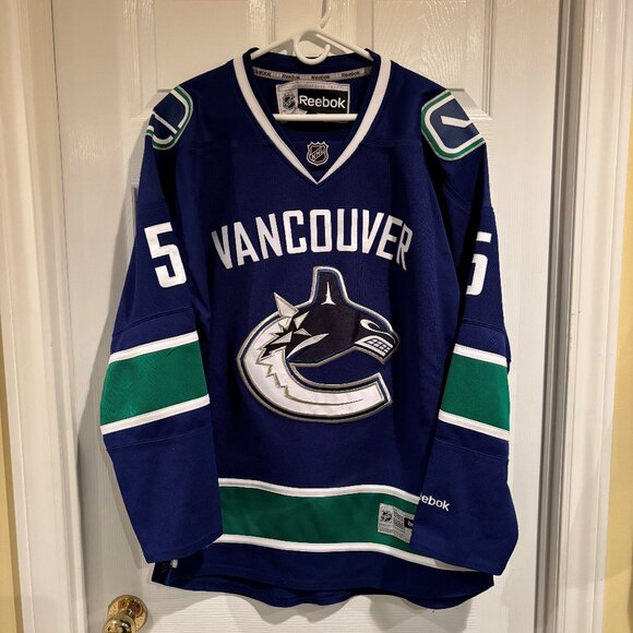 Men's Vancouver Canucks Derrick Pouliot #5 Reebok Home Jersey - Picture 1 of 4